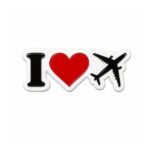 ستيكر معدني I Love Travel بتصميم قلب وطائرة.